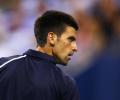 Djokovic in groove as Serbia lead Belgium in Davis Cup