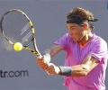 Nadal overcomes slow start to advance in Chile