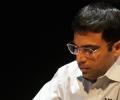 Anand held by Caruana; slips to joint third