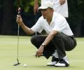 In a first, Obama playing golf with Tiger Woods