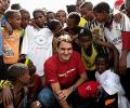 Federer plays big brother to village kids at charity event