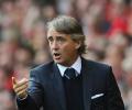 Mancini swears he is fed up of questions over future