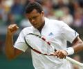 Tsonga saves five match points to knock out Tomic