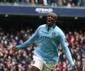 Toure, Tevez strike to give City glimmer of hope