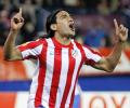 Falcao keeps 10-man Atletico perfect at home