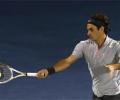 Federer puts journeyman Jaziri in his place after blip