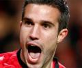 Van Persie shines again as Manchester United march on