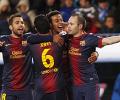 La Liga: Record for Barca as they march on at Malaga