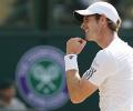 Murray lifts Wimbledon title, makes history