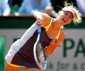 Sharapova survives horror show, Azarenka grinds through