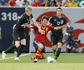 Spain beat Ireland 2-0 with two late goals