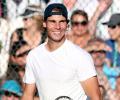 Rivals Federer, Nadal set to meet in last eight