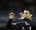 Ronaldo double lifts Real to second in La Liga