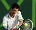 Djokovic breezes past Somdev at windy Miami