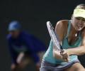 Sharapova powers through to Miami quarters