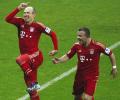 Bayern crush Hamburg 9-2 to stride towards title