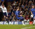 Sigurdsson strike helps Spurs hold Chelsea