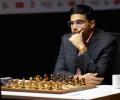 Anand crushes Topalov, moves to joint second