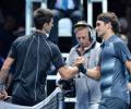 Djokovic douses Federer's fire, Nadal crushes Ferrer