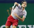 Djokovic canters as Federer makes winning return