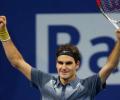 Federer strengthens bid for Tour finals with Pospisil win