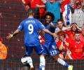 Liverpool stunned by Chelsea, City win to blow title race wide open