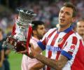 Atletico strike early to beat Real and win Spanish Super Cup