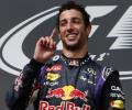 Ricciardo wins at Spa after title rivals collide