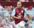 Villa's Agbonlahor wins red card appeal in match against United