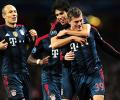 Champions League: Bayern win at Arsenal, Atletico beat Milan