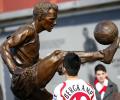 Arsenal honour Dennis Bergkamp with statue at Emirates stadium