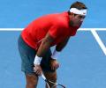 Del Potro beaten, Nadal thrives in scorching Melbourne