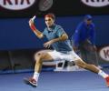 Vintage Federer routs Tsonga to book Murray quarter-final