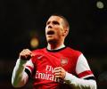 FA Cup: Podolski double helps Arsenal rout Coventry City