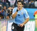 After biting ban...Suarez returns to Uruguay