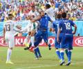 Godin header puts Uruguay in last 16 and Italy out