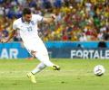 Samaras penalty sends Greece through, breaks Ivorian hearts