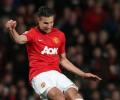 Van Persie hat-trick takes Manchester Utd past Olympiakos Piraeus