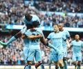 Soccer Roundup: Aguero sizzles for City in derby; Barca lose again