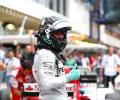 Rosberg beats Hamilton to pole in Brazil