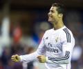 Ronaldo grabs double as Messi breaks goal record