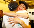 Proud Nicole kisses Hamilton to celebrate his world title win