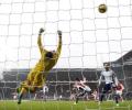 Arsenal edge past West Brom, United crush Hull