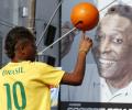 Soccer legend Pele improving, still in intensive care