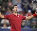 Federer sets up Djokovic showdown in Shanghai semis