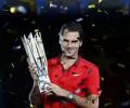 Federer downs injured Simon to win Shanghai Masters