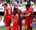 Four goals in last seven minutes as Liverpool beat QPR