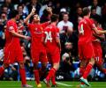 EPL PHOTOS: 'Lucky' Liverpool strike late to down QPR on dramatic weekend