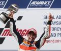 Marquez roars to record-equalling 12th win