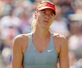 US Open: Wozniacki upsets Sharapova, Simon stuns Ferrer